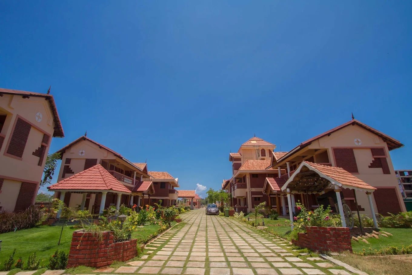 GS Resort, Nagapattinam — cottages along the stone driveway